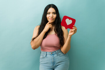 Latin woman thinking about online dating social media like