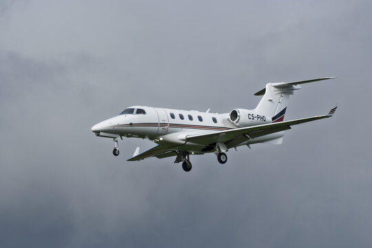 Geneva, Switzerland - october 26, 2025 : sign and logo on an Embraer Phenom 300 business jet operated by NetJets Europe Landing at Geneva Airport