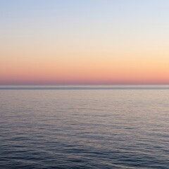 Obraz premium A pristine ocean seascape at sunset featuring a perfectly flat, unbroken horizon line and soft, diffused atmospheric light ,outdoor ,marine ,background