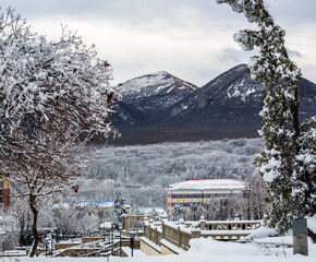 View over a resort-town of Zheleznovodsk with Beshtau mountain in the background in winter. Panorama
