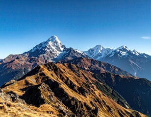 Snowcapped Mountains under a Clear Blue Sky