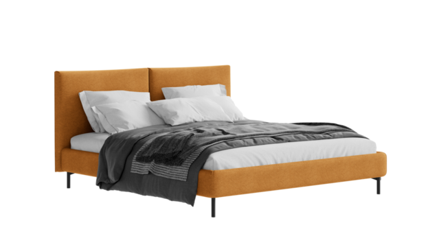 Contemporary orange double bed with comforter and pillows on an isolated background. 