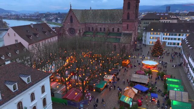 Basel Christmas Market Aerial Shot. Illuminated Basler Weihnachtsmarkt in the evening Twilights at Winter in Switzerland
