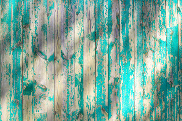 Peeling paint on old wooden planks. Abstract background
