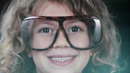 a small girl with glasses with code - Powered by Adobe