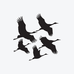 Obraz premium Set of flying bird silhouettes vector illustration