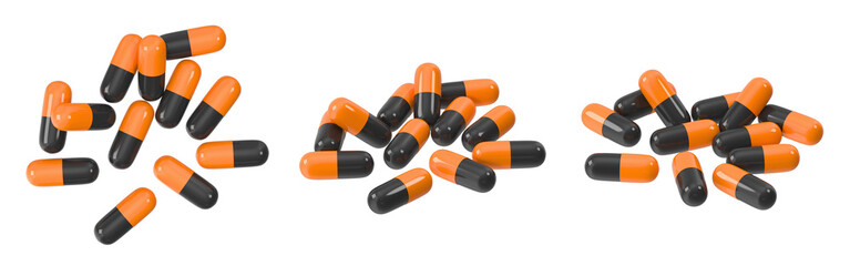 Orange and black capsules scattered on a white background, medicine concept