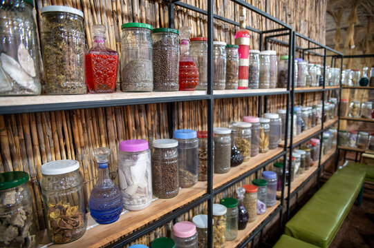 jars with spices on a shelve