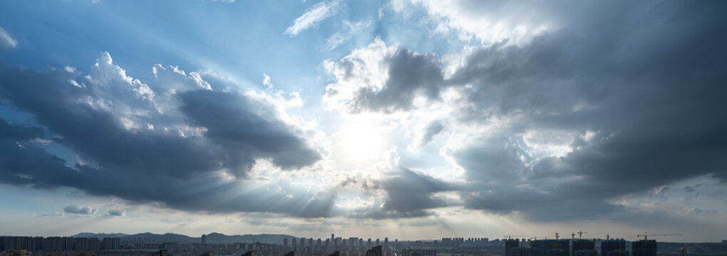 Sun rays through dramatic clouds