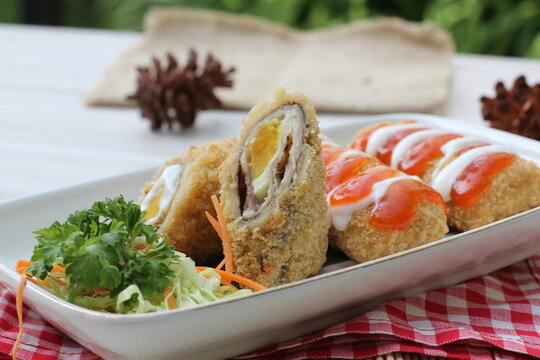 Chicken and egg yolk rolls