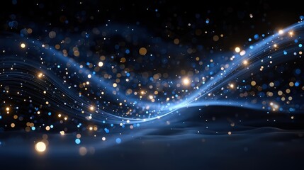 Abstract blue and gold light trails with sparkling bokeh on a dark background