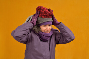 Woman wearing three wool hats