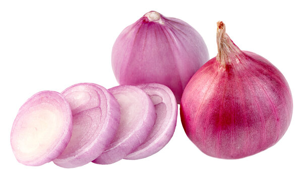 Whole red onions and sliced red onion rings isolated. Fresh and vibrant ingredients for cooking, with a focus on texture and color. High quality food photography.