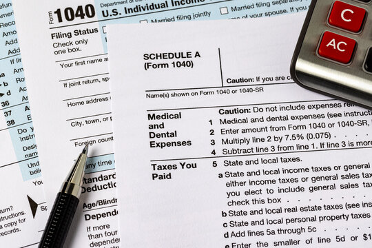 Medical and dental expenses section on income tax forms. Tax credit, medical expense deduction and tax return concept.