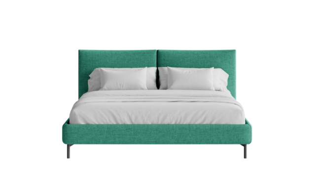 Modern bed with a comforter and pillows on an isolated background.