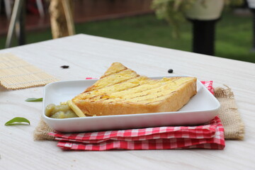 Toasted bread on a table with a natural background 