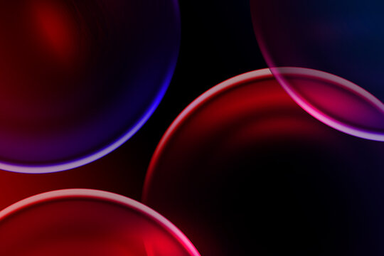 Close up abstract liquid spheres background composition overlapping shapes glowing colorful contours deep dark red blue purple backdrop vibrant digital wallpaper