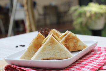 6 slices of toast on a plate 
