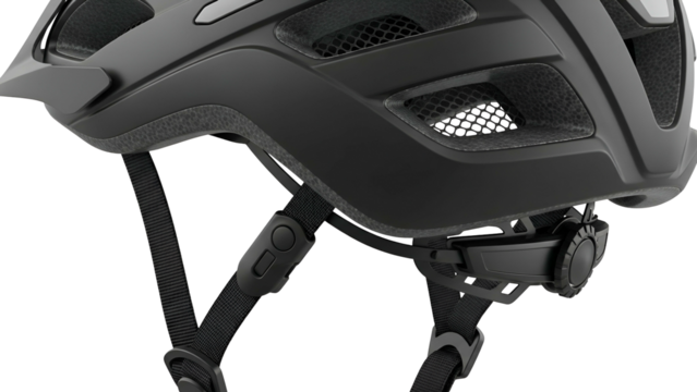 Close-up of a matte black bicycle helmet with ventilation and adjustable straps
