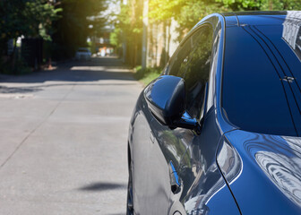 Fototapeta premium car parking on the road side fold in rear mirror