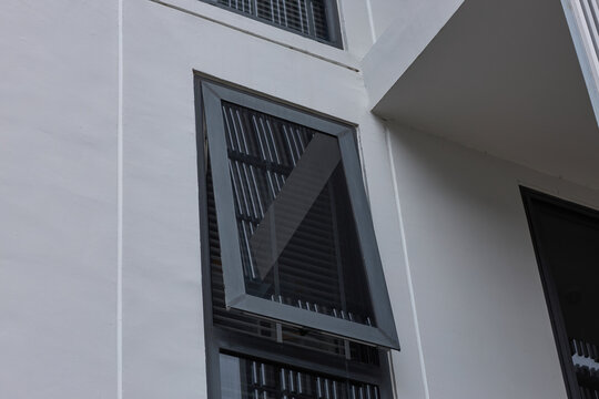 black aluminum window frames on a white wall