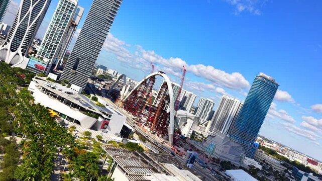 Aerial inversion roll Downtown Miami approaching Signature Bridge 2025