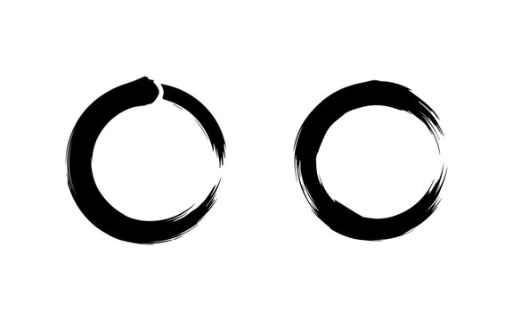 Two hand-drawn black enso circles, symbolizing enlightenment and the universe.