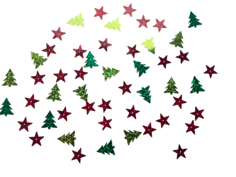 Christmas holiday confetti background with scattered glittery red stars and green trees on a neutral soft gray surface, top view with copy space.