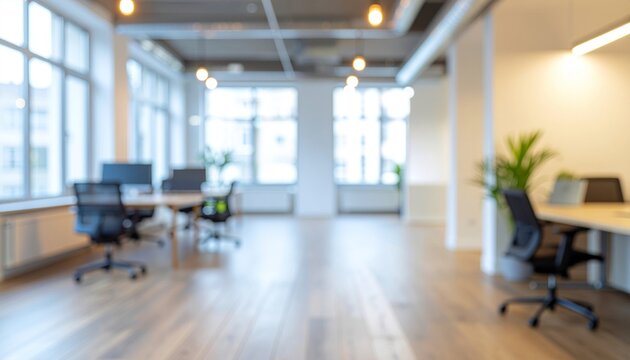 フトフォーカス　ぼやけたオフィスの背景画像　白色基調のモダンなオフィス