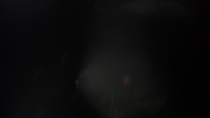 High-contrast filmic over-exposure and rapid light pulse Cinematic Light Leak Overlay. Ideal for drama, suspense, and energetic narrative sequences.