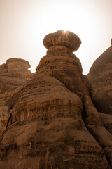 Wind eroded sandstone formations photographed in backlight