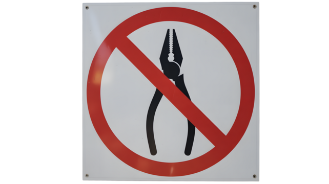 Restricted tools warning sign in bold red prohibition circle for safety compliance and hazard prevention, promoting a secure work environment now