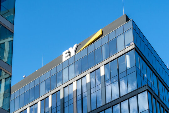 Warsaw, Poland - September 04, 2025: EY logo on modern office building facade