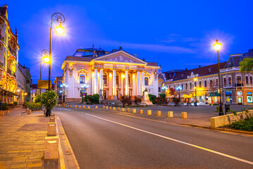 Oradea, Romania: Night view of Oradea State Theater, a historical building that houses Regina Maria Theater and the Szigligeti Theater, Crisana, Transylvania