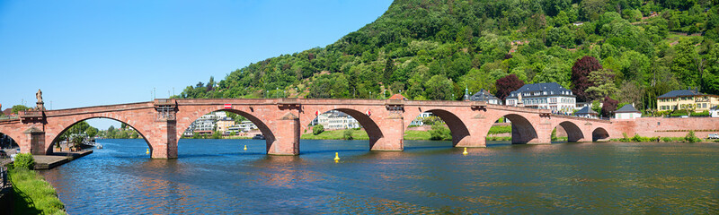 Historic old brick bridge in Heidelberg over the Neckar river