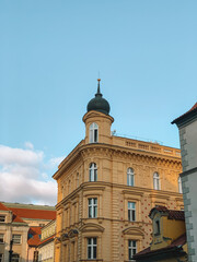 Obraz premium Sunny Day in Prague Old Town, Czech Republic with Historic Architecture and Blue Skies