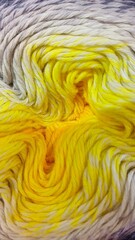 Yarn gradient texture with yellow and grey wool winding