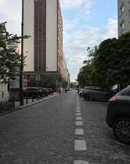 Obraz premium Morning city. Deserted streets, free of people. Rising summer sun. Green, calm urban spaces. Biodesign, urban landscape. Mrs. Warsaw. Palac Kultury 
