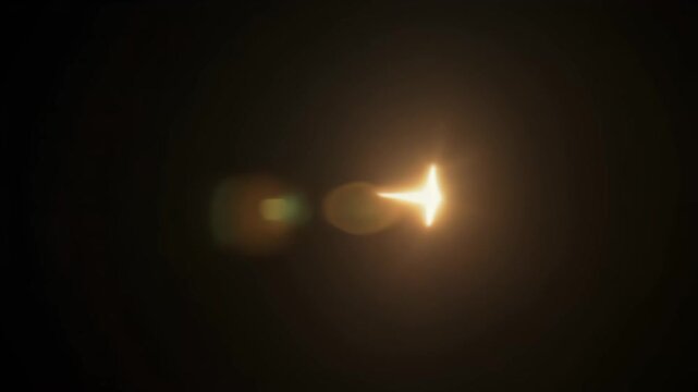 Tiny Glowing Speck Drifting in a Zigzag Path Before Fading Into Darkness Visual Effect Scene