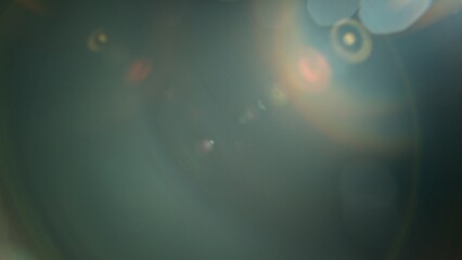 Abstract background of real lens flare for overlay or transition