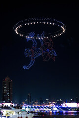 Bangkok,Thailand - November 22, 2025 : Vijit Chao Phraya 2025, AI Drone Show Festival in Thailand, Mobile Drones, Riverfront light show.
