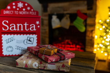 Santa Mailbox with Christmas Gifts and Festive Holiday Decor Indoors