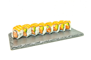 Classic California roll uramaki with kanikama, avocado, cucumber, and Japanese mayonnaise, wrapped in orange tobiko roe