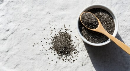 Chia Seeds in Wooden Spoon and Bowl Top View