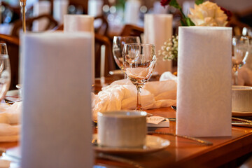 The wedding table in close up view with bokeh background