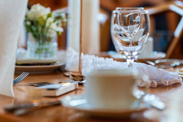 The wedding table in close up view with bokeh background