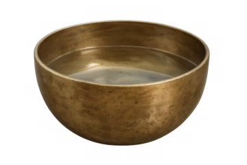 Singing bowl with water for sound bathing and healing therapy, creating mindfulness through ancient spiritual tradition
