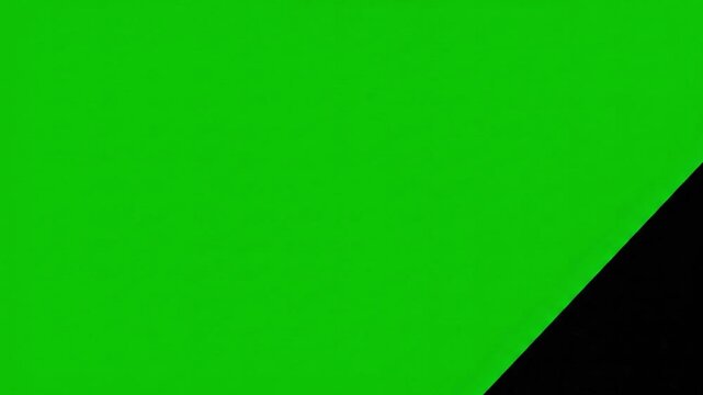 Simple black page turn or wipe transition on a green screen for revealing content.
