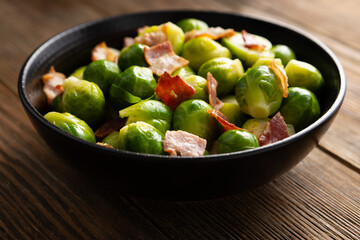 Brussels sprouts roasted with bacon in bowl