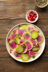 Winter watermelon radish salad rustic surface top view